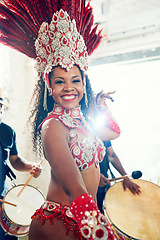 Image showing Samba, music and dance with woman at carnival with drums for celebration, party and festival in Rio de Janeiro. Summer break, show and creative with brazil girl for performance, holiday and culture