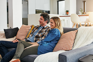 Image showing Happy couple, relax and watching tv in home for movie, film show and news broadcast in living room. Mature man, woman and smile on sofa for television series, video subscription or streaming platform