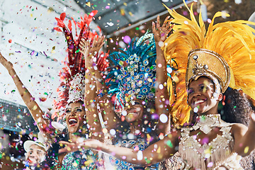 Image showing Happy woman, samba dance and confetti in celebration for party, event or festival at carnival. Women dancer in rio for traditional dancing, music or festive band performance in happiness together