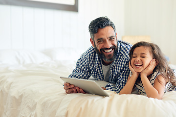 Image showing Bed, digital tablet and girl laughing with father, relax and sharing comic or joke in their home together. Happy, comedy and parent and with girl in bedroom online for funny meme or subscription