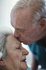 Image showing Elderly, kiss and couple in hospital for healthcare, visiting sick patient and hope for recovery. Clinic, senior man and woman kissing on forehead with love, care and empathy, kindness and comfort.