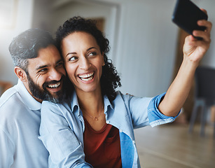 Image showing Happy couple, smile and selfie for profile picture, social media or vlog together relaxing at home. Man and woman in relationship smiling for photo, online post or memory and bonding in living room