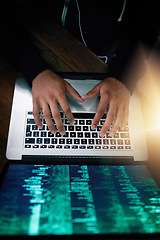 Image showing Hands, laptop and overhead with a man programmer coding while typing on a keyboard for software development. Computer language, information technology and cyberspace with a male coder in the office