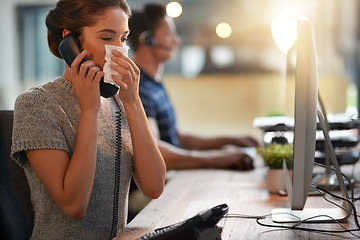 Image showing Sick, phone call and a woman blowing nose for allergies, virus or flu while at work. Contact, business and a young female employee talking on a telephone with a disease, covid or allergy in an office