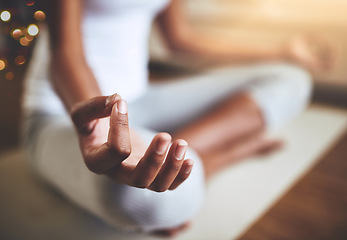 Image showing Woman, hands and yoga in meditation for relax, zen workout or spiritual wellness on floor mat at home. Closeup of female yogi hand for calm relaxation, awareness or mental wellbeing indoors