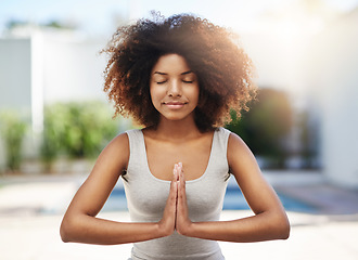 Image showing Calm woman, yoga and relax in meditation for zen, spiritual wellness or healthy exercise outdoors. African person in meditate with hands together for chakra, mind or peace for health and fitness