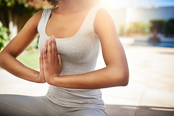 Image showing Woman, hands and yoga in meditation for mindfulness, zen or spiritual wellness on floor mat outdoors. Hand of calm female yogi meditating for peaceful mind and awareness for healthy mental wellbeing