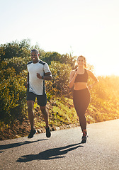 Image showing Freedom, running and happy with couple in road for workout, cardio performance and summer. Marathon, exercise and teamwork with black man and woman runner in nature for sports, training and race