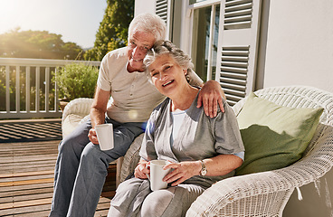 Image showing Hug, patio and portrait of senior couple with coffee enjoying bonding, quality time and relax in morning. Love, retirement and elderly man and woman embrace with drink for breakfast outdoors at home