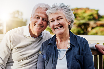 Image showing Senior couple, portrait and relaxing together outdoors or romantic retirement and park bench. Elderly, partners and affectionate faces or in love or date and feeling care or happy outside garden