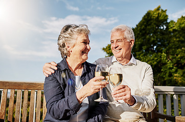 Image showing Love, cheers and wine glass, old couple in summer to celebrate romance or anniversary on patio of vacation home. Happiness, senior man and woman with champagne toast, smile and romantic on holiday.