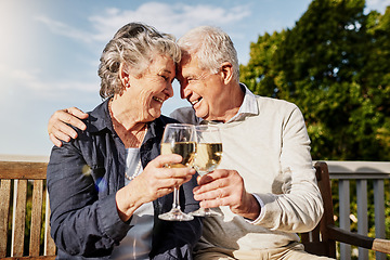 Image showing Love, cheers and happiness, old couple with wine glass to celebrate anniversary on patio of vacation home. Romance, senior man and woman in embrace with champagne toast, smile and romantic holiday.