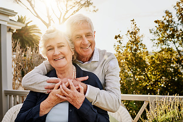 Image showing Hug, patio and portrait of senior couple at sunrise enjoy bonding, quality time and relax in morning. Love, retirement home and face of elderly man and woman smile for marriage, trust and happiness