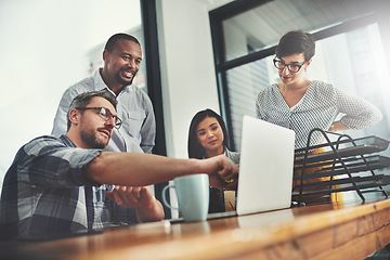 Image showing Collaboration, laptop and review with business people in meeting for project management, coaching or planning. Technology, website and training with group of employees in office for teamwork and idea