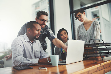 Image showing Teamwork, laptop and pointing with business people in meeting for project management, review or planning. Technology, website and training with group of employees in office for collaboration and idea