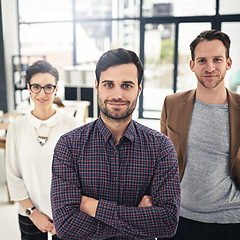 Image showing Portrait, teamwork and leadership with a business man and his team standing in the office together. Management, leader and collaboration with a group of businesspeople looking confident about work