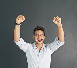 Image showing Portrait, celebration and business man on wall background, excited and isolated with mockup. Winner, achievement and male professional celebrate winning, happiness and goals, success and good news.