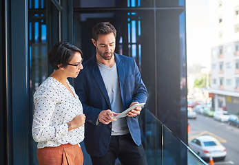 Image showing People with tablet, business meeting and teamwork with strategy, technology and digital agenda at city office. Collaboration, professional man and woman working together with online project planning