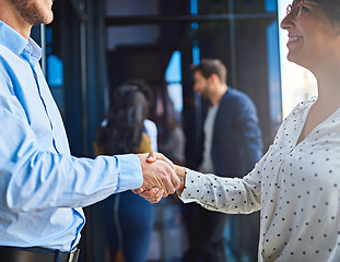 Image showing Handshake, business people in meeting and partnership, trust in team and onboarding or hiring. Professional agreement, deal and collaboration with man and woman shaking hands, teamwork and thank you