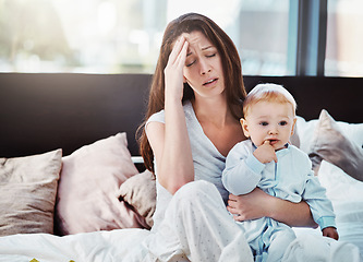 Image showing Mother, baby and tired or stress in a home bedroom or bed with postpartum, headache or anxiety. Depression, mental health and burnout of a woman or mom with a child in a family house with fatigue