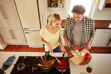 Image showing Top view, food or couple in the kitchen cooking with healthy vegetables for lunch meal or dinner together. Love or woman helping or talking to mature husband in meal preparation in Sydney, Australia