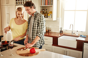 Image showing Smile, food or happy couple in the kitchen cooking with healthy vegetables for lunch or dinner together. Love or woman helping or talking to mature husband in meal preparation at home in Australia