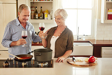 Image showing Toast, wine or old couple cooking food for a healthy vegan diet together with love in retirement at home. Happy, cheers or senior woman drinking in house kitchen to celebrate with husband at dinner