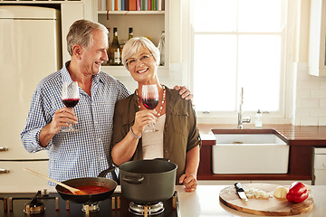 Image showing Smile, wine or portrait of old couple cooking food for a healthy vegan diet together with love in retirement at home. Happy senior woman hugging or drinking in kitchen with mature husband at dinner