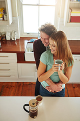 Image showing Hugging, coffee or happy couple speaking in kitchen at home bonding or enjoying quality time together. Embrace, affection or above of mature man relaxing or drinking espresso tea with woman at home