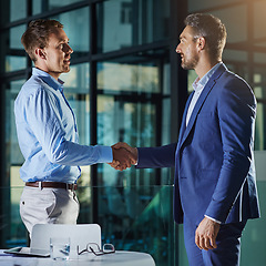 Image showing Business people, handshake and partnership or collaboration, onboarding or employment and hiring in office. Corporate, men and executive shaking hands for agreement or b2b, crm and recruitment