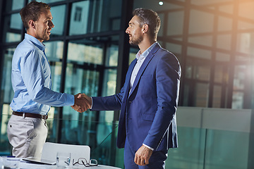 Image showing Business people, handshake and b2b success or partnership, agreement and networking in office. Corporate, men and executive shaking hands with new client, merger or collaboration on deal or job