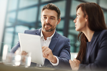 Image showing Meeting, tablet and planning with business people in the office for research on a company team project. Teamwork, technology or brainstorming with a corporate man and woman people talking at work