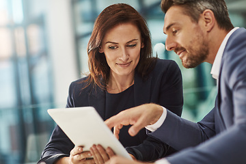 Image showing Tablet, meeting or planning with a business man and woman in the office for research on a company project. Collaboration, technology and brainstorming with corporate team talking strategy at work