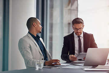 Image showing Tablet, laptop and business man with partner in corporate meeting, teamwork and planning or data analysis of profit. Professional people on digital technology of financial report or b2b collaboration