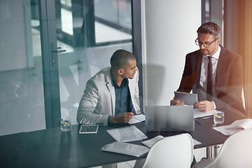 Image showing Planning, tablet and business man with partner in conference room, meeting or discussion of corporate, finance data. Professional people, leader or accountant on digital tech app for financial advice