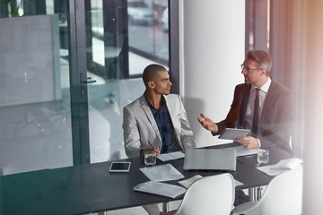 Image showing Advice, tablet and business man or boss in meeting, conference room and window reflection for financial planning. Professional people, accountant manager or advisor on digital tech talking of finance