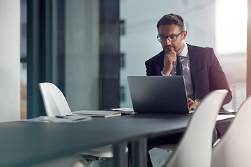 Image showing Business man, computer and thinking, ideas and reading online for decision, choice or solution in review or report. Planning, focus and problem solving of corporate person or ceo on laptop in office