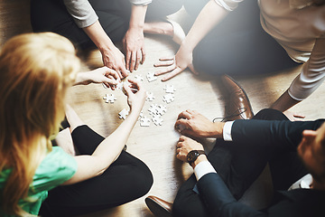 Image showing Puzzle, teamwork and group of people thinking, planning or solution, collaboration or problem solving and challenge. Team building games, project workflow and women, men or circle brainstorming above