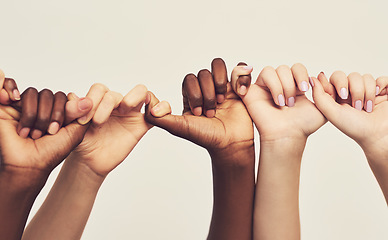 Image showing People, holding hands or thumb together for support, diversity and kindness on studio background. Team or group of friends fingers for unity, promise and solidarity or trust and community diversity