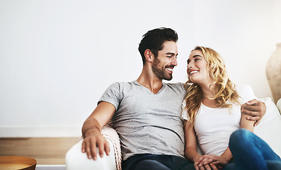 Image showing Smile, relax or happy couple hugging on house sofa bonding or smiling with trust or loyalty together. Smile, lovers or woman enjoys quality time with a romantic man on couch on weekend break at home