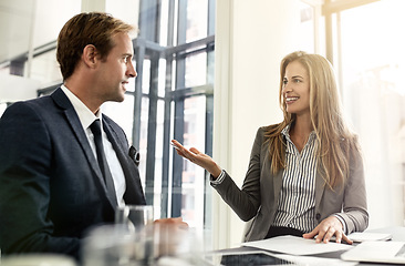 Image showing Meeting, employees and staff with teamwork, consultation and conversation for brainstorming, ideas and collaboration. Partnership, man and happy woman with happiness, professional and communication