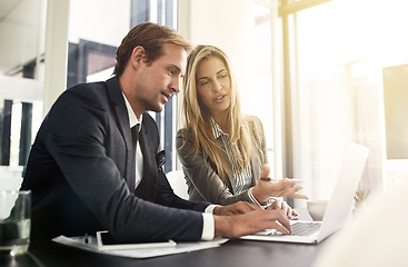 Image showing Business man, woman or partner on laptop and pointing, typing or help with question, talking or workplace. Businessman, female manager and computer for corporate training, teamwork or solution at job