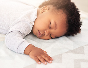 Image showing Baby, african boy and sleep in bedroom for rest, health and peace for growth, development and relax in family home. Black male infant, tired and sleeping on bed with fatigue, quiet and calm in house