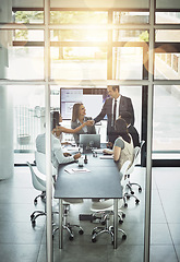 Image showing Business meeting, partnership and b2b handshake in office for partnership, trust and startup deal. Businessman, shaking hands and team in a boardroom for synergy, integration and thank you gesture