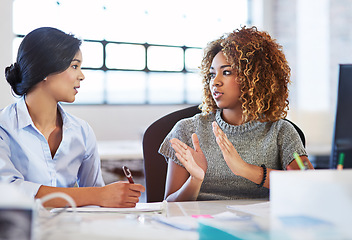 Image showing Teamwork, meeting and planning with business women in the office, talking about company strategy. Collaboration, partnership and communication with a female employee chatting to a colleague at work