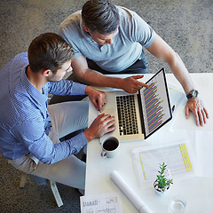 Image showing Laptop data, discussion and business people teamwork on stats analysis, accounting or finance research. Pointing gesture, cooperation and top view of accountant team working on chart analytics review