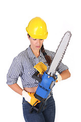 Image showing Beauty woman with chainsaw