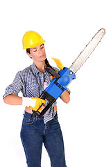 Image showing Beauty woman with chainsaw