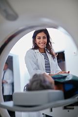 Image showing Doctor, mri and portrait of woman with patient to comfort in hospital for machine scanning. Ct scan, holding hands or smile of medical professional with senior person in radiology test for healthcare