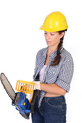 Image showing Beauty woman with chainsaw